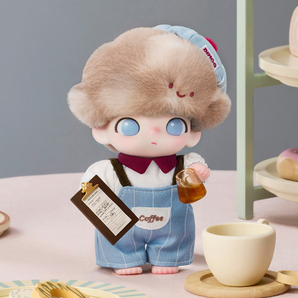DIMOO illustration enjoying a cup of coffee, capturing the perfect blend of cozy moments and artistic charm.