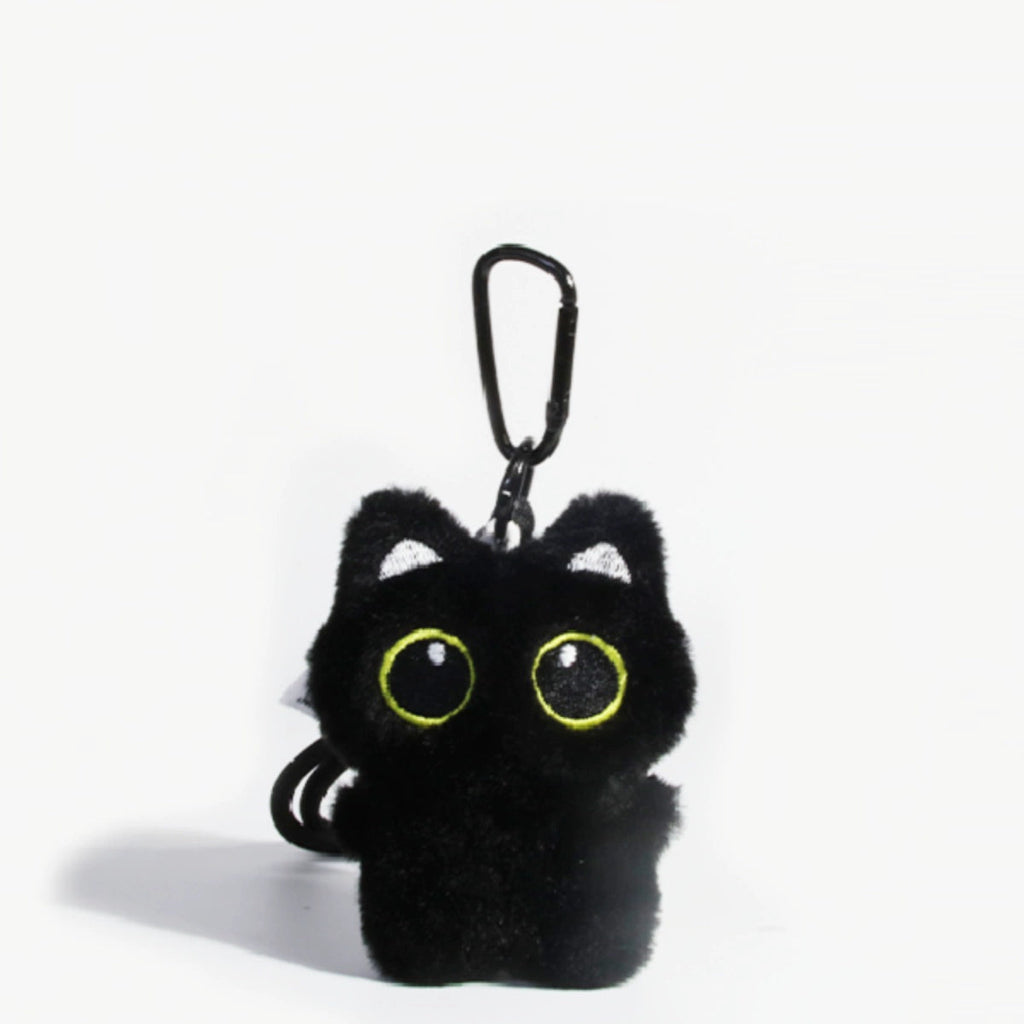 Big-eyed black cat plush keychain perfect for adding charm to bags and accessories