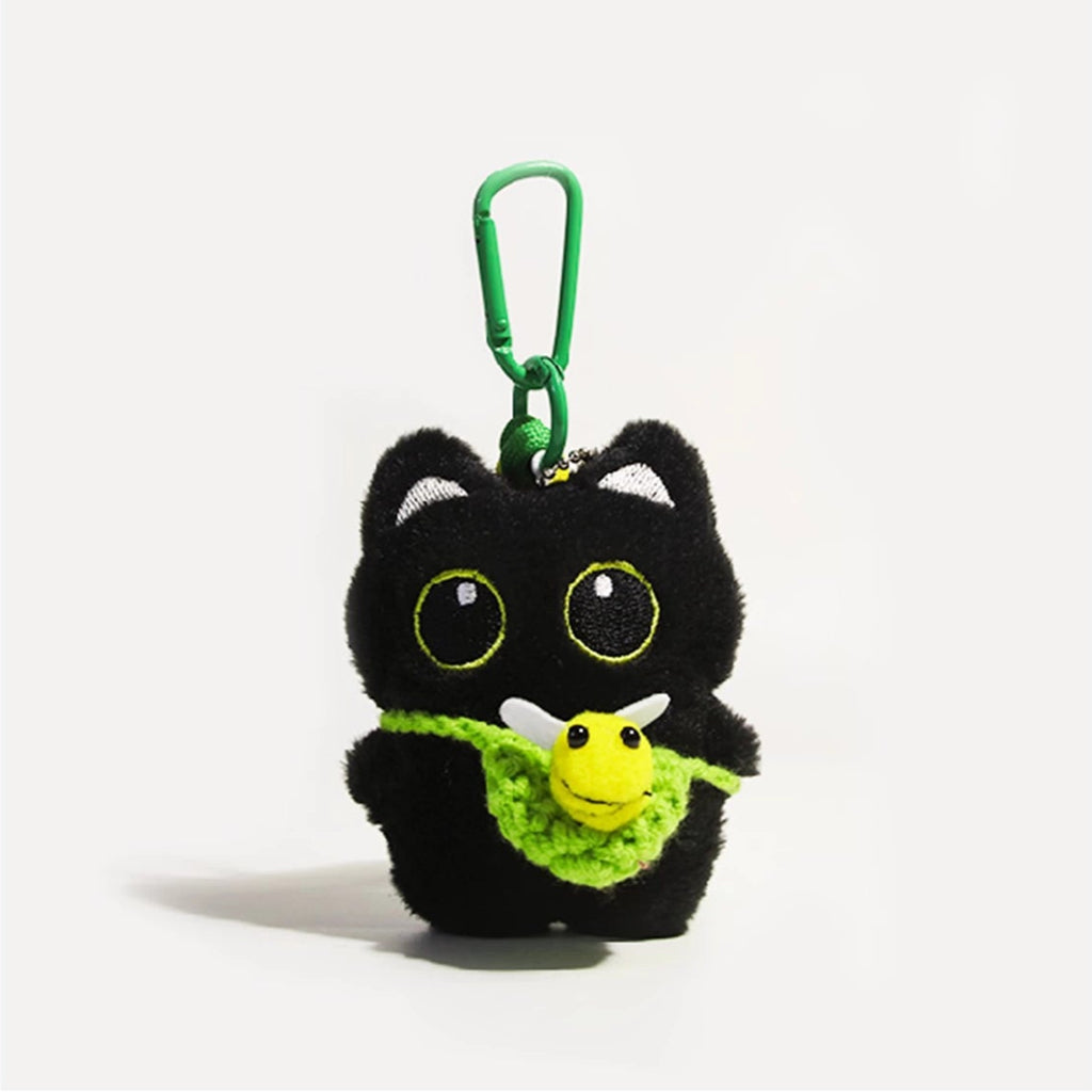 Big-eyed black cat plush keychain perfect for adding charm to bags and accessories
