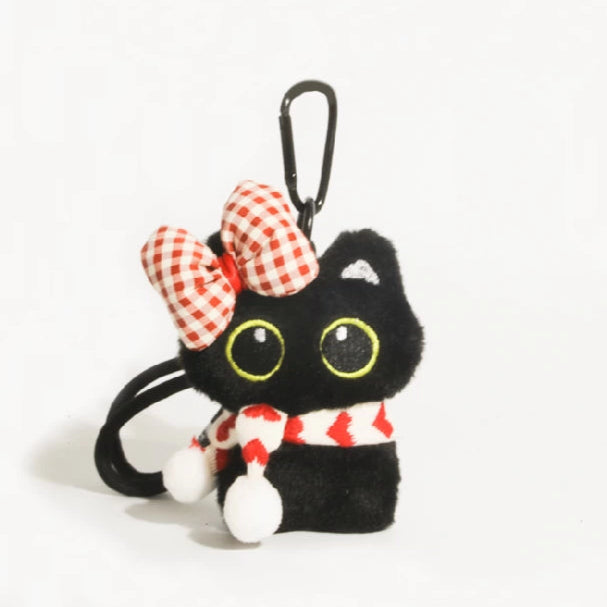 Big-eyed black cat plush keychain perfect for adding charm to bags and accessories