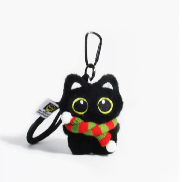 Big-eyed black cat plush keychain perfect for adding charm to bags and accessories