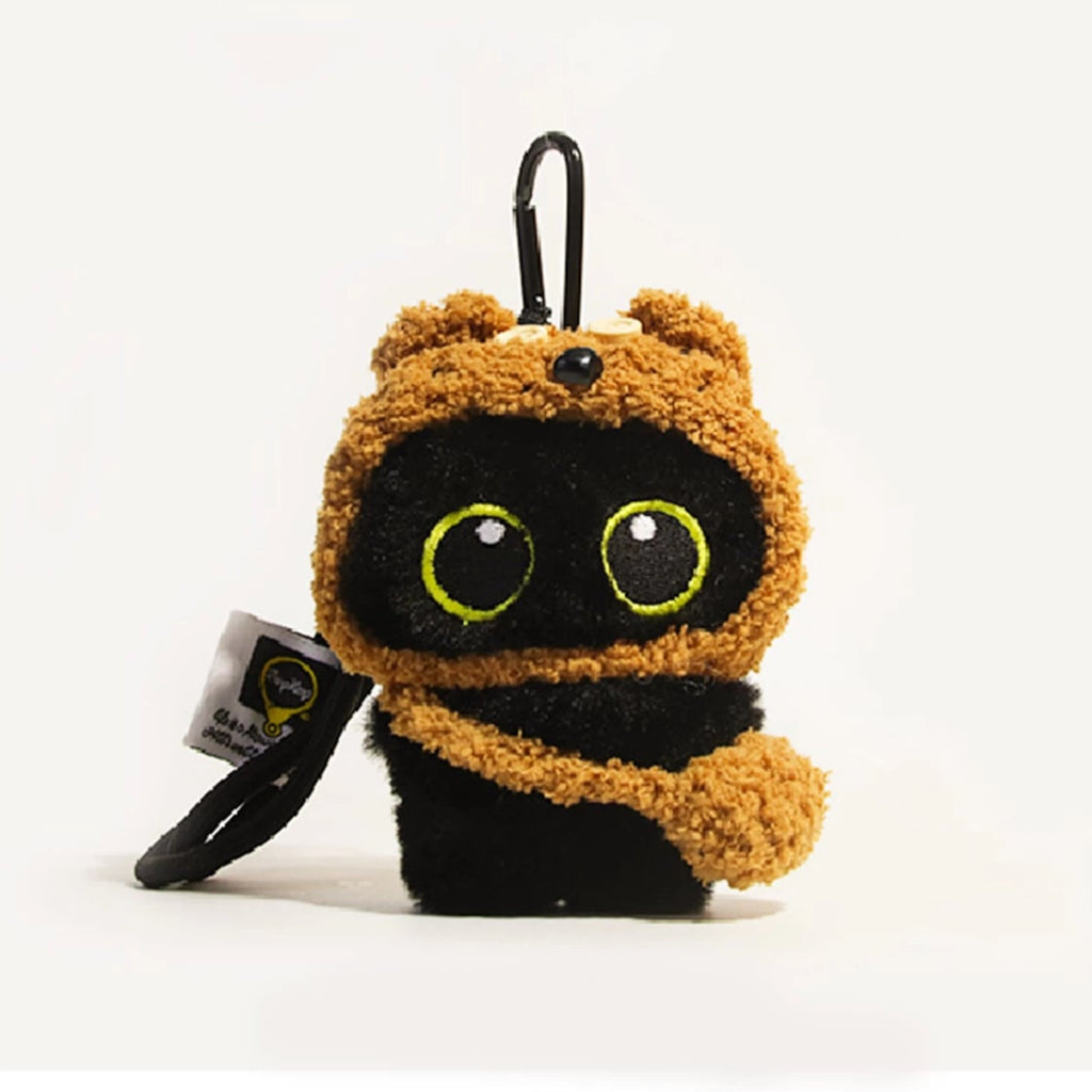 Big-eyed black cat plush keychain perfect for adding charm to bags and accessories